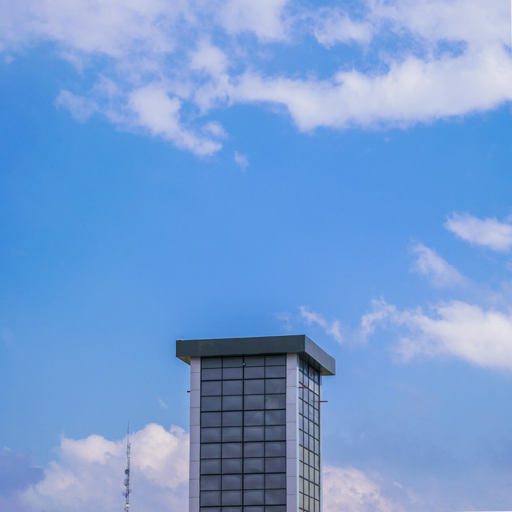 white and black building under blue sky during daytime