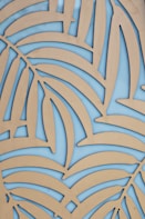 An elegant textile pattern featuring sage green and denim blue hues.