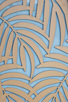 An elegant textile pattern featuring sage green and denim blue hues.