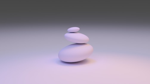 white round stone on white surface