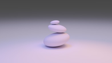 white round stone on white surface