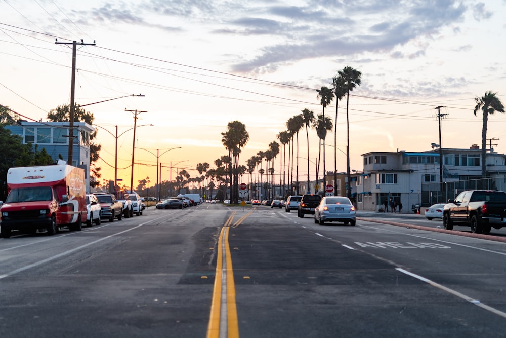 cars on road near buildings during daytime