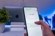 person holding white android smartphone