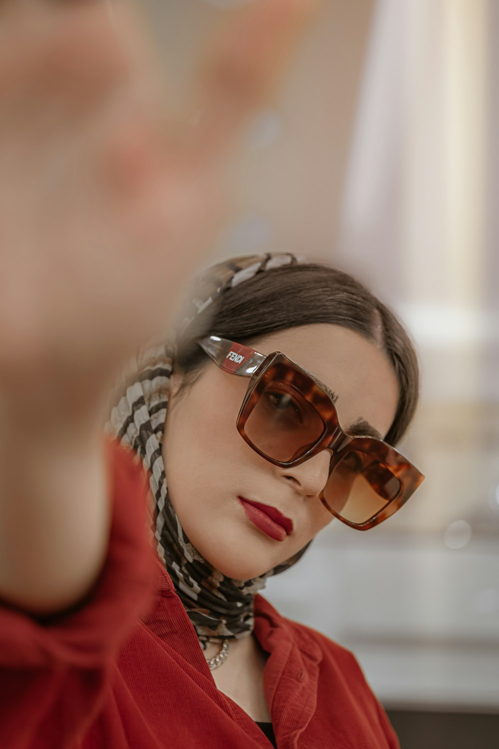 girl in brown framed eyeglasses