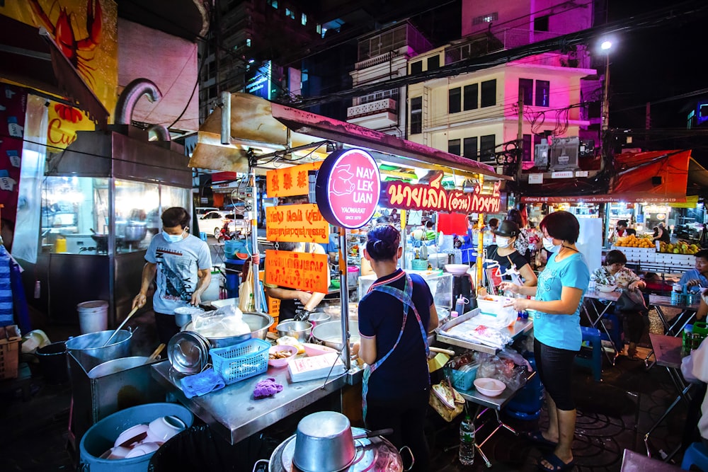 people in market during daytime