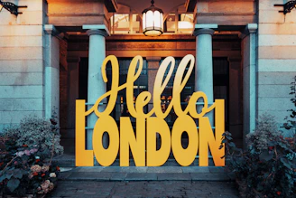 yellow and black wooden signage