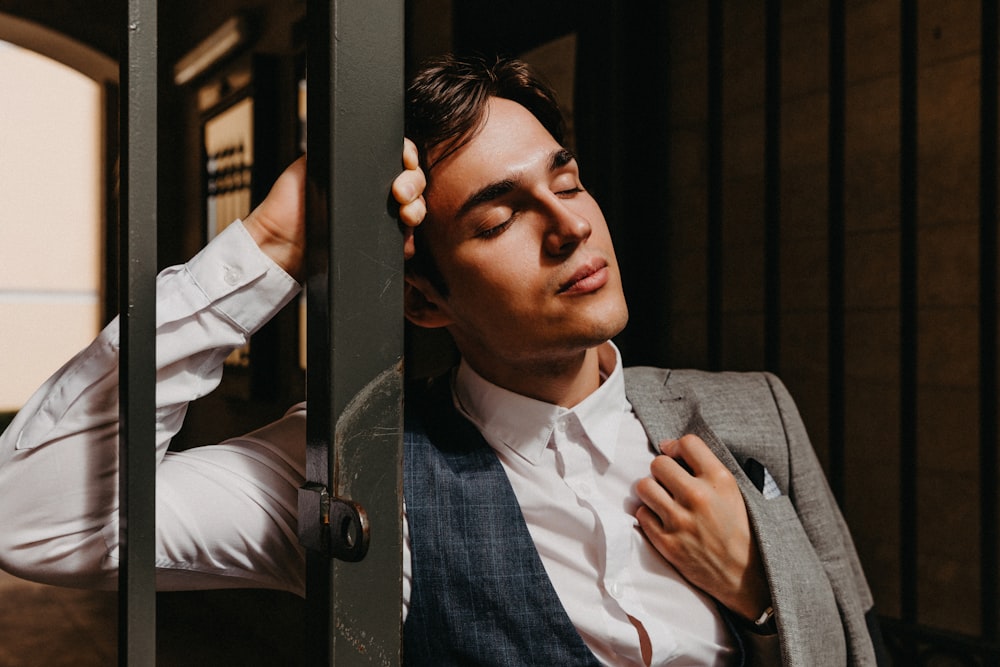 man in gray suit jacket