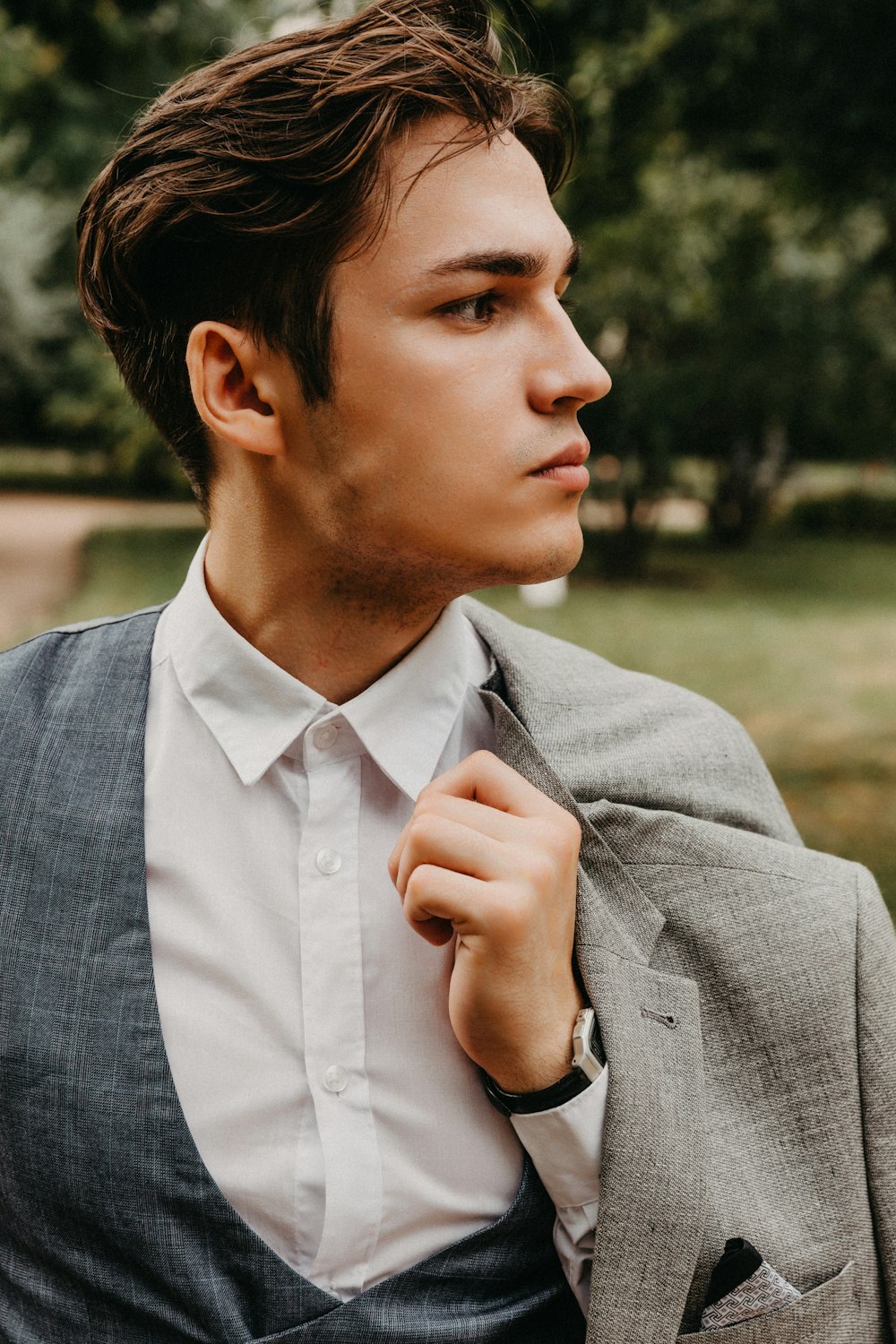 man in gray suit jacket