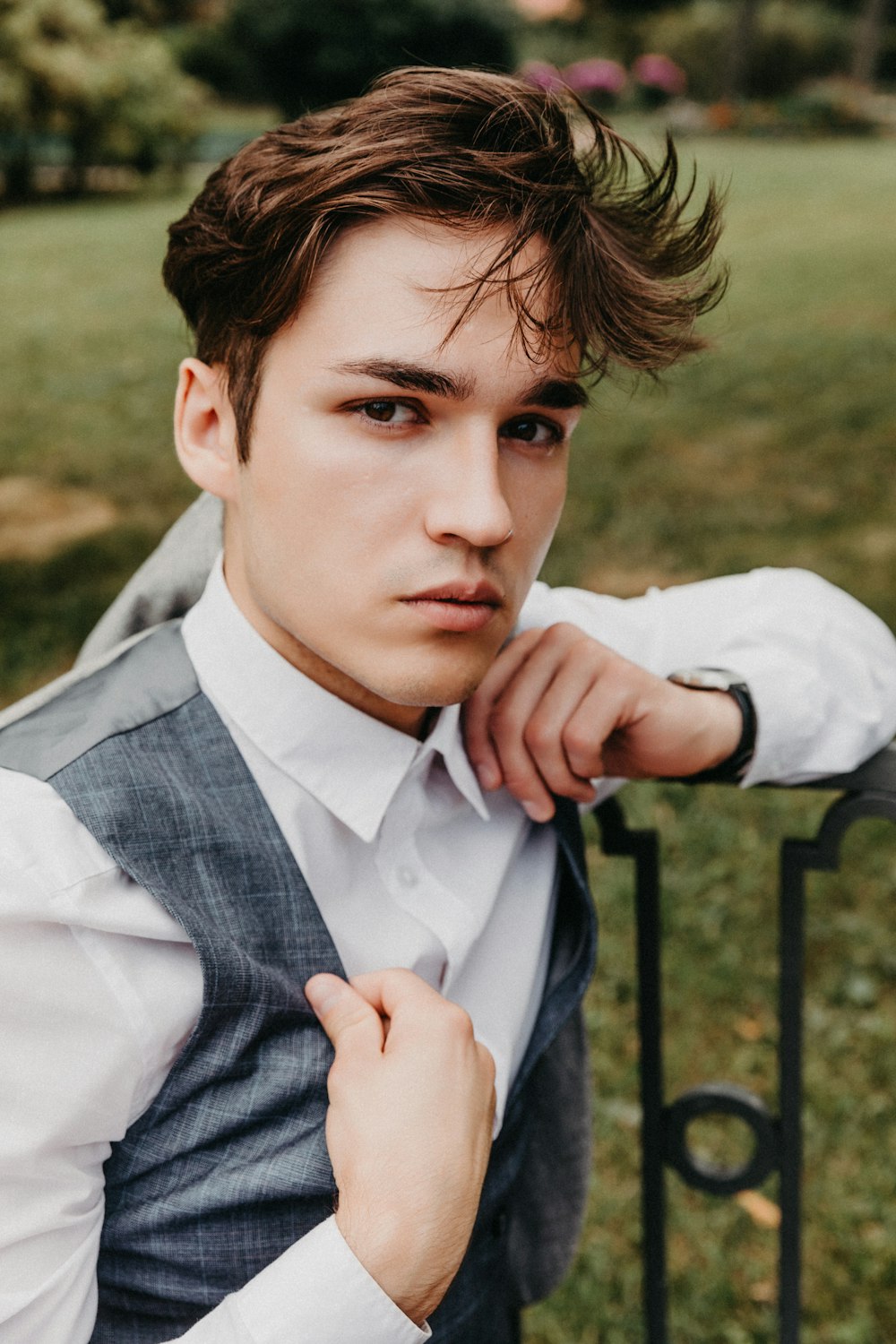 boy in white dress shirt and gray necktie