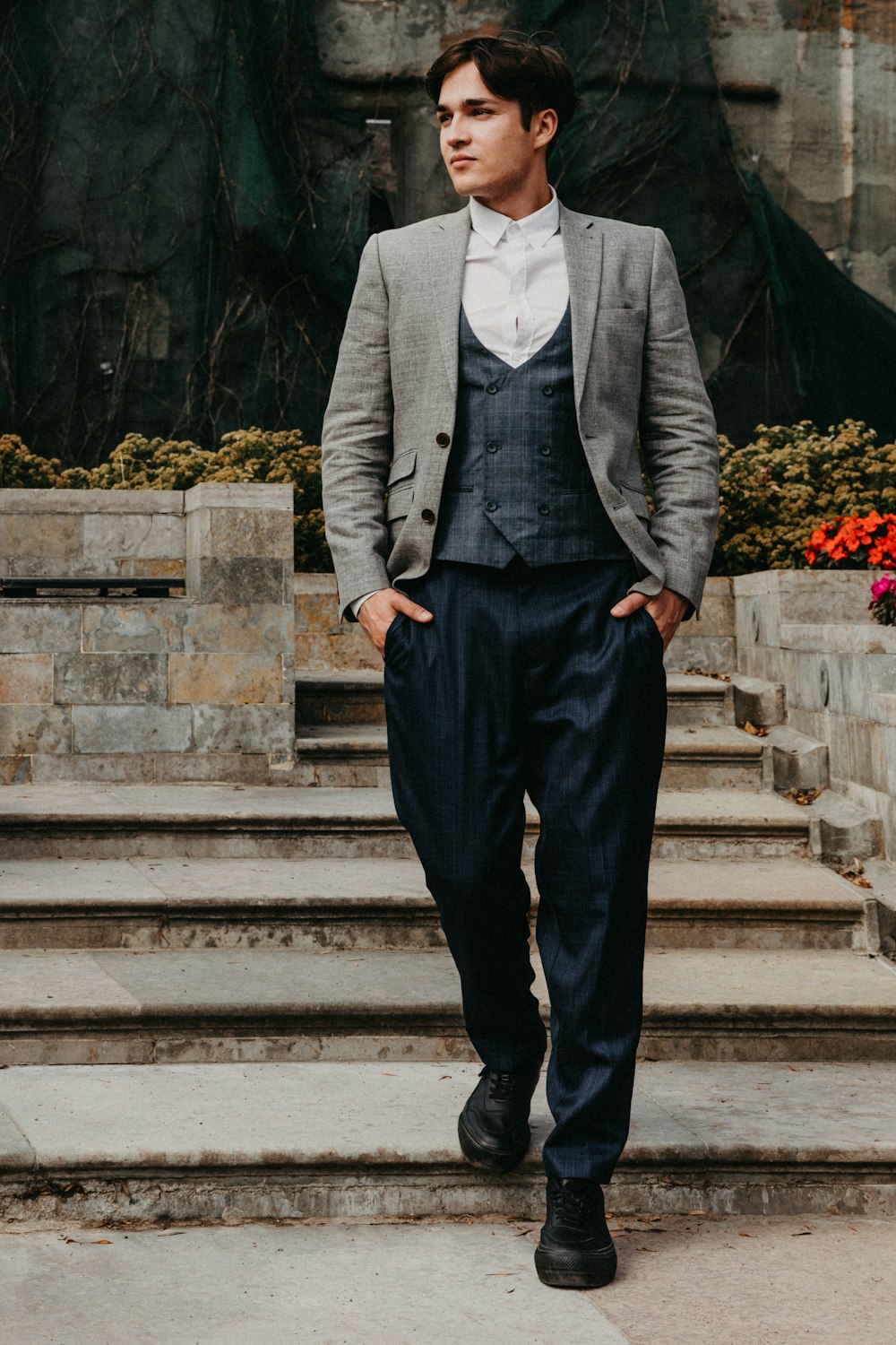 man in black suit jacket and black dress pants