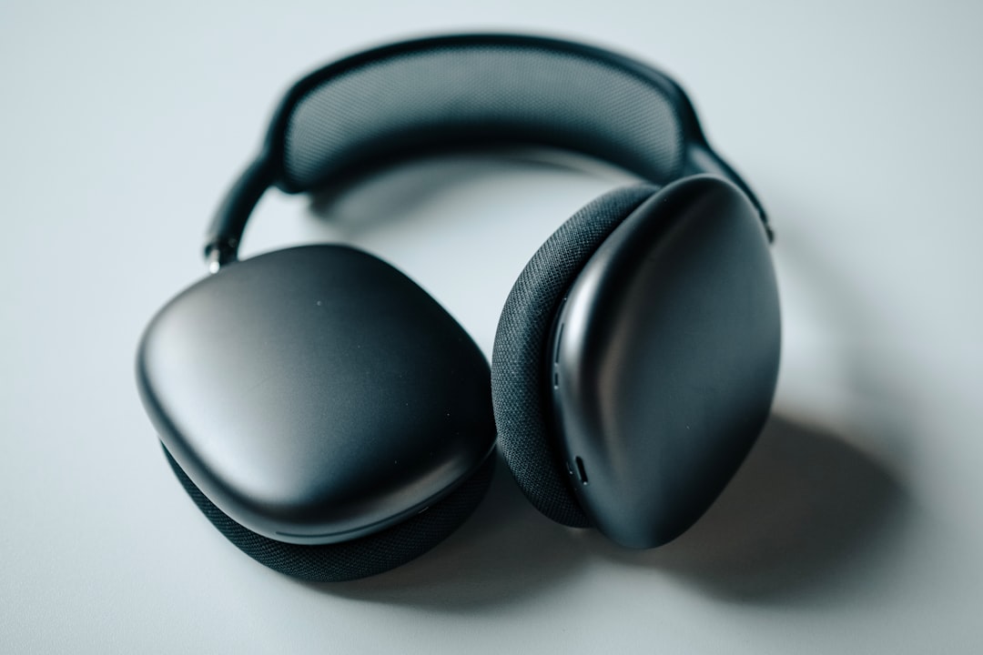 black headphones on white table