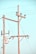 Wooden utility poles with cross-arms hold multiple power lines against a clear blue sky. Electrical insulators are attached to the poles, and there is a transformer box visible.