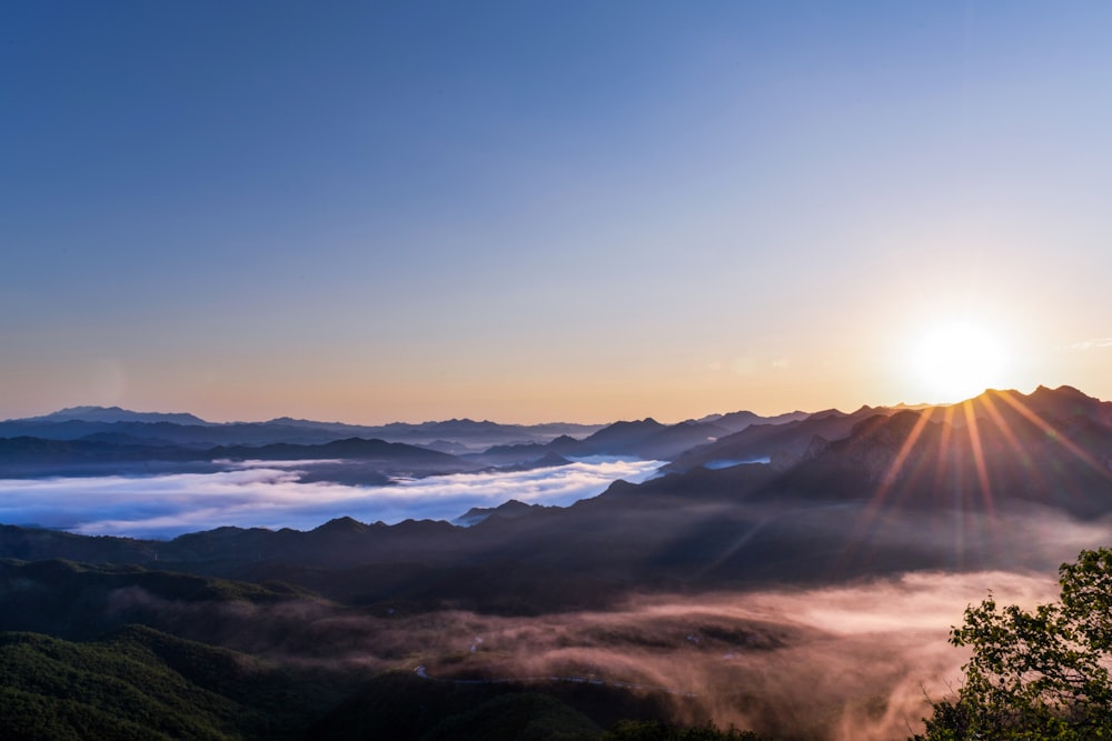 mountains under blue sky during daytime