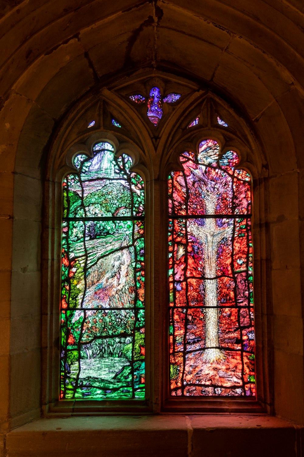 red green and brown floral glass window