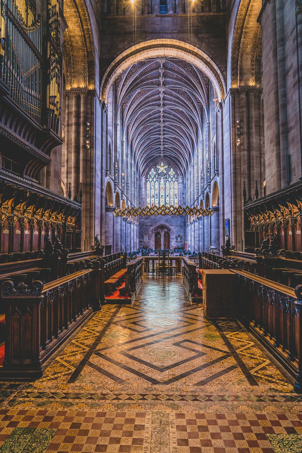 brown wooden benches inside cathedral