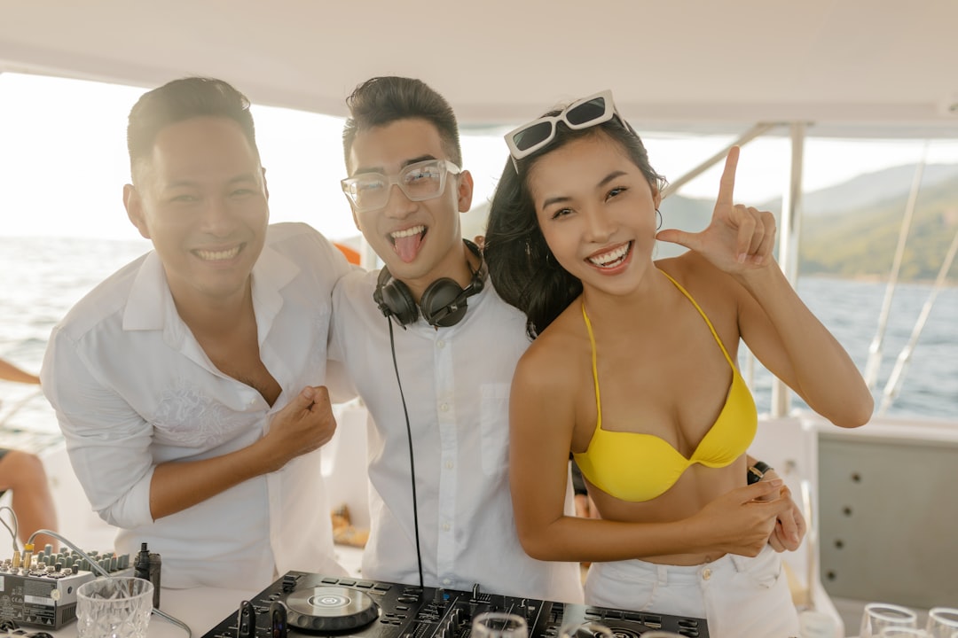 woman in yellow brassiere beside man in white tank top