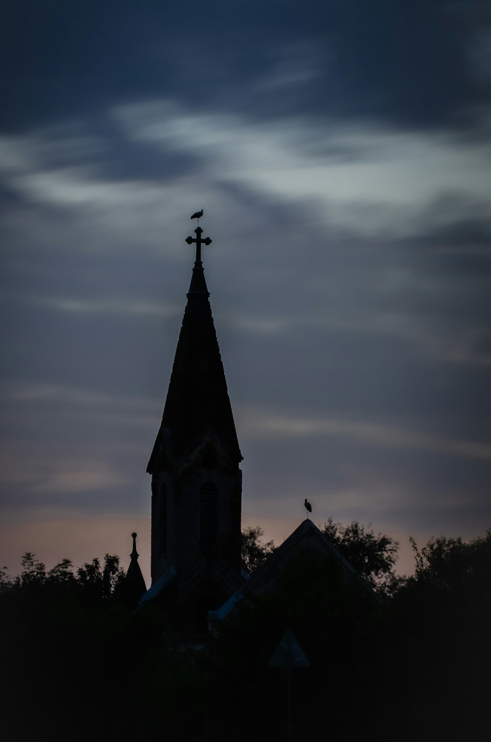 silhouette of church during sunset