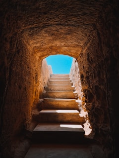 brown concrete tunnel during daytime