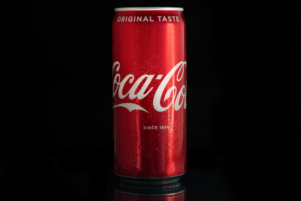 Coca cola can on black surface photo – Free Soda Image on Unsplash