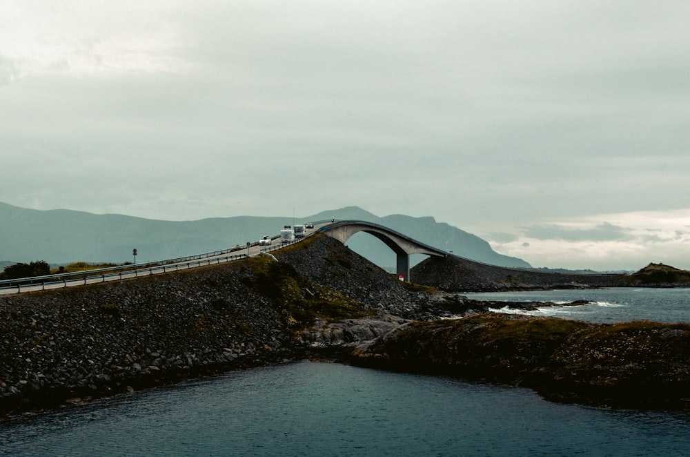 gray concrete bridge over the sea