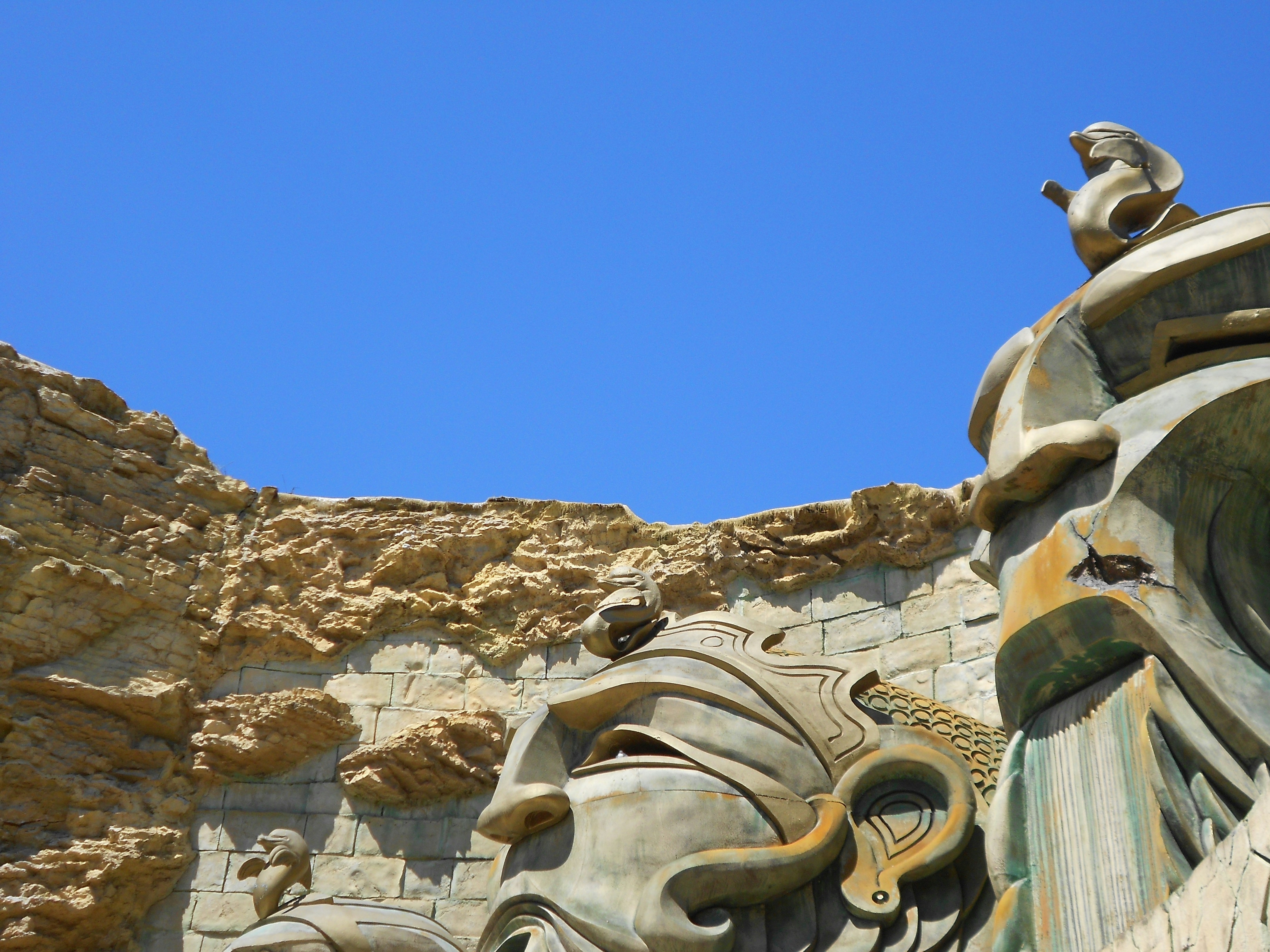 Brown concrete statue under blue sky during daytime photo – Free Italy ...