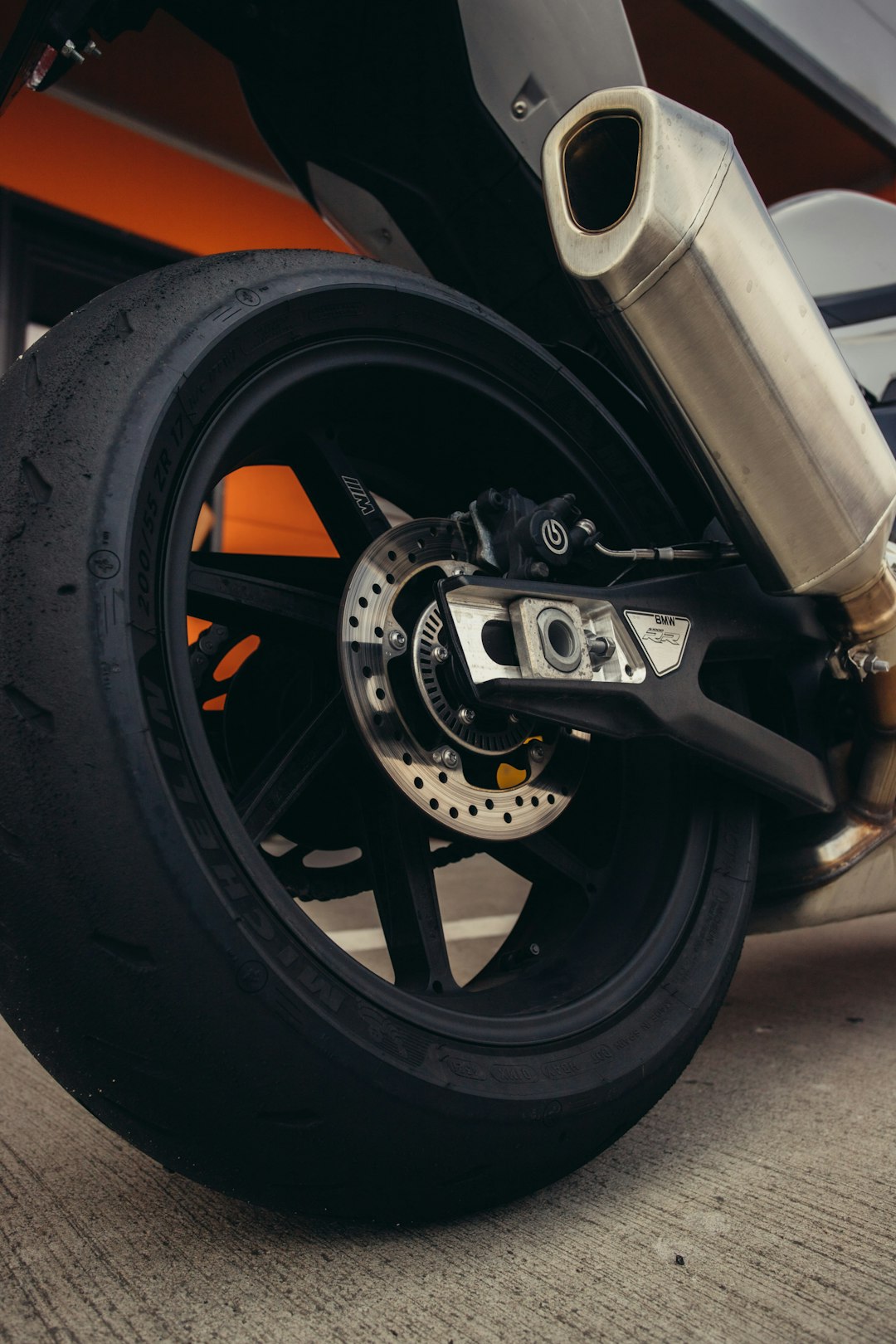 black and orange motorcycle wheel