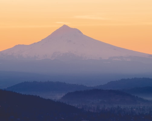 mountain range under blue sky during daytime