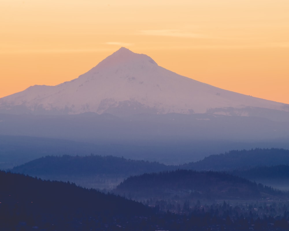 mountain range under blue sky during daytime