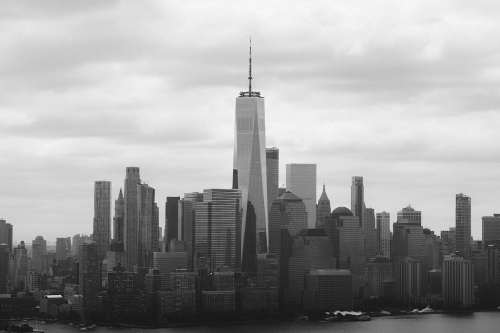 grayscale photo of city buildings