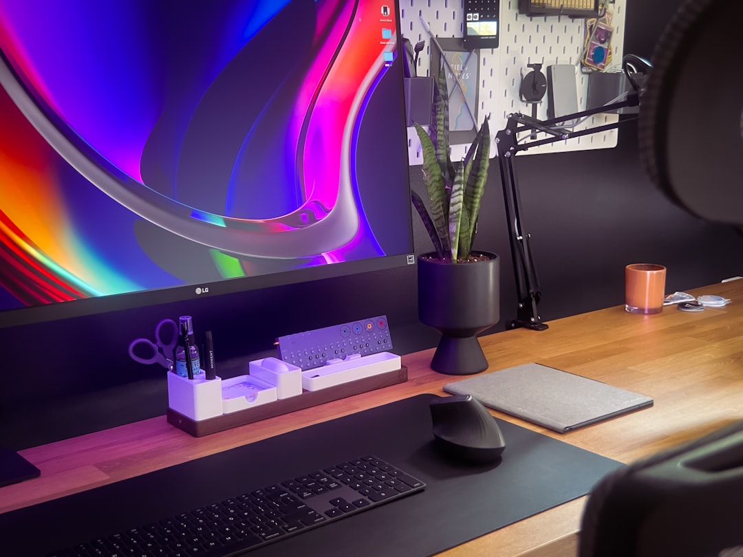 black computer keyboard on brown wooden desk