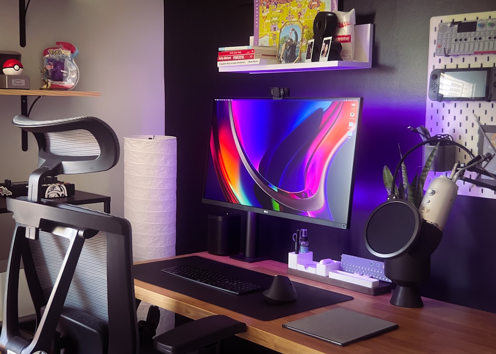 silver imac on brown wooden desk