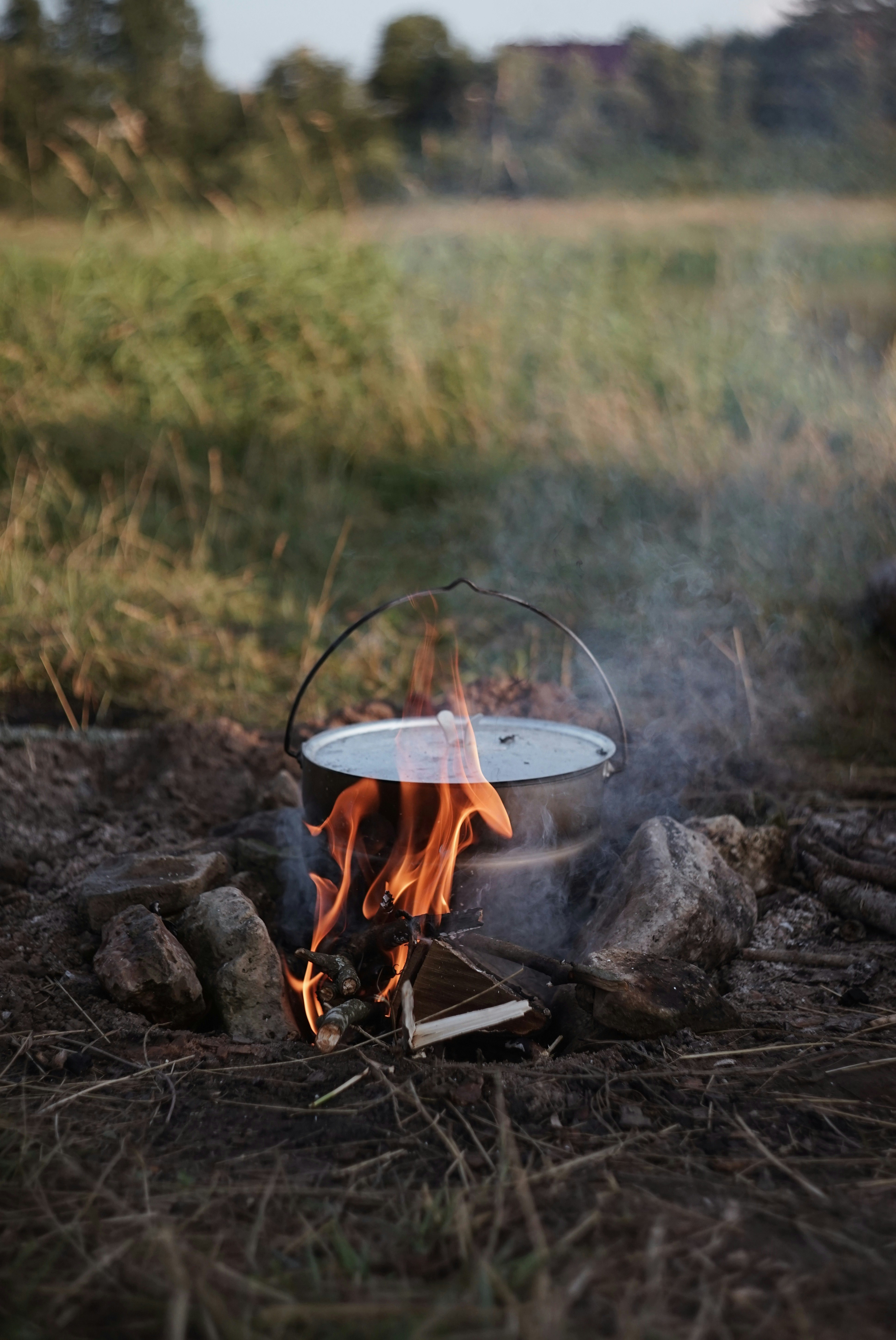 red fire on black charcoal grill