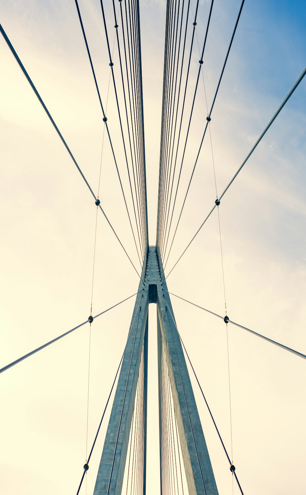 white and gray bridge under white sky