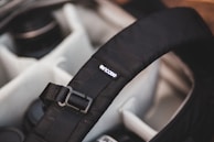 Interior shot showing multiple compartments inside a sports bag, highlighting organization.