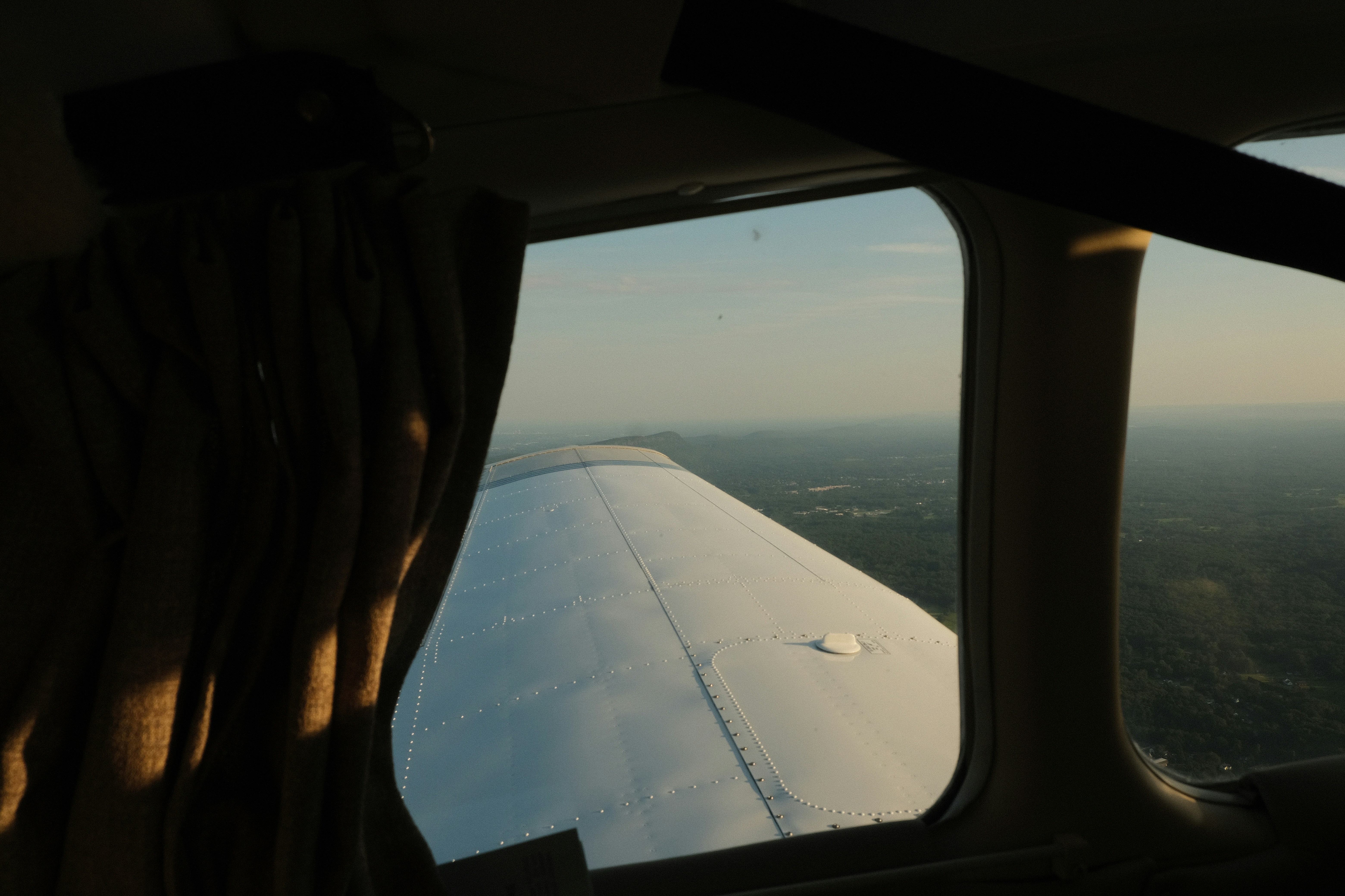 airplane window view of white clouds during daytime, 