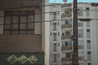 Street view of Águas Santas neighborhood with contemporary buildings.