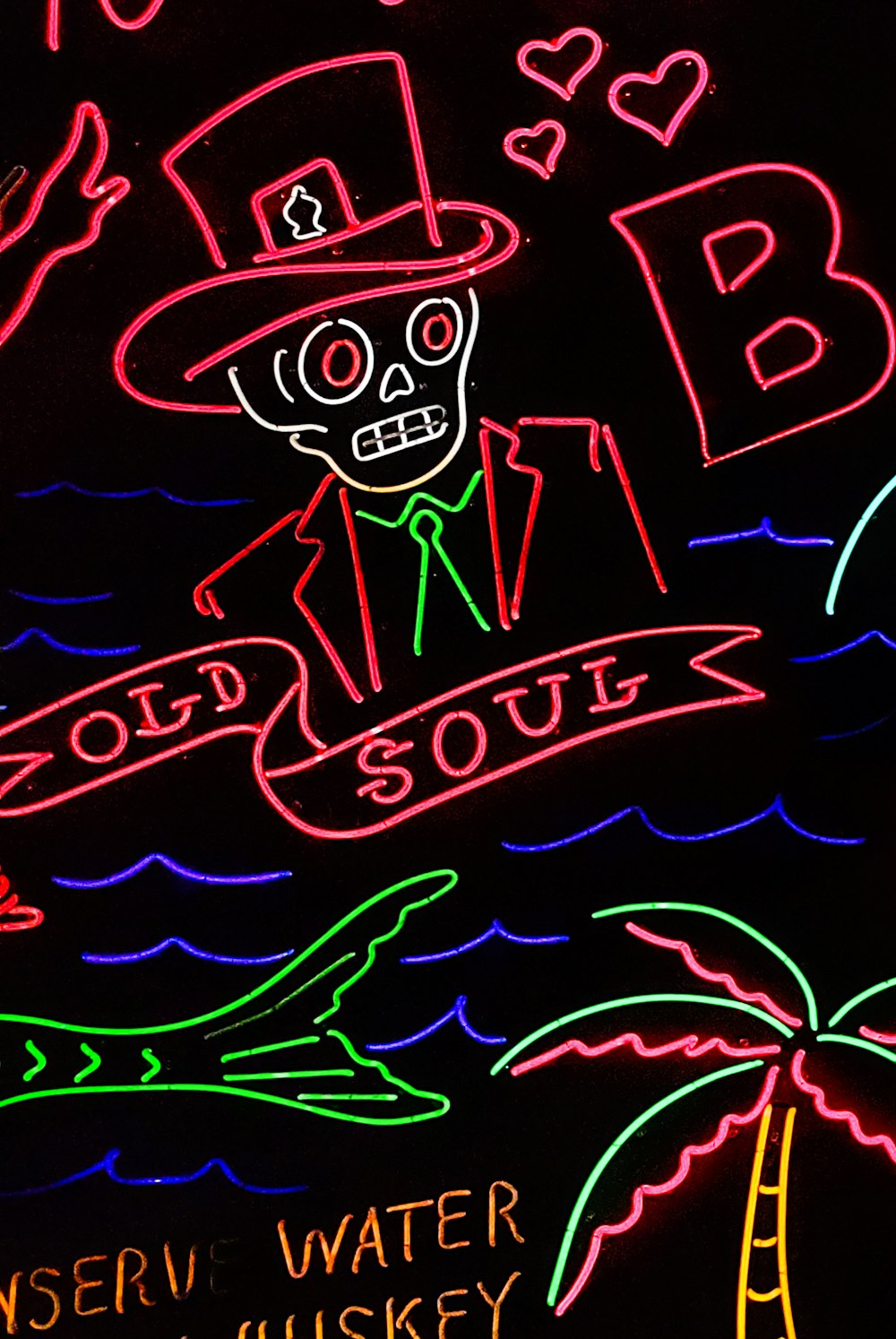 a neon sign with a man in a top hat