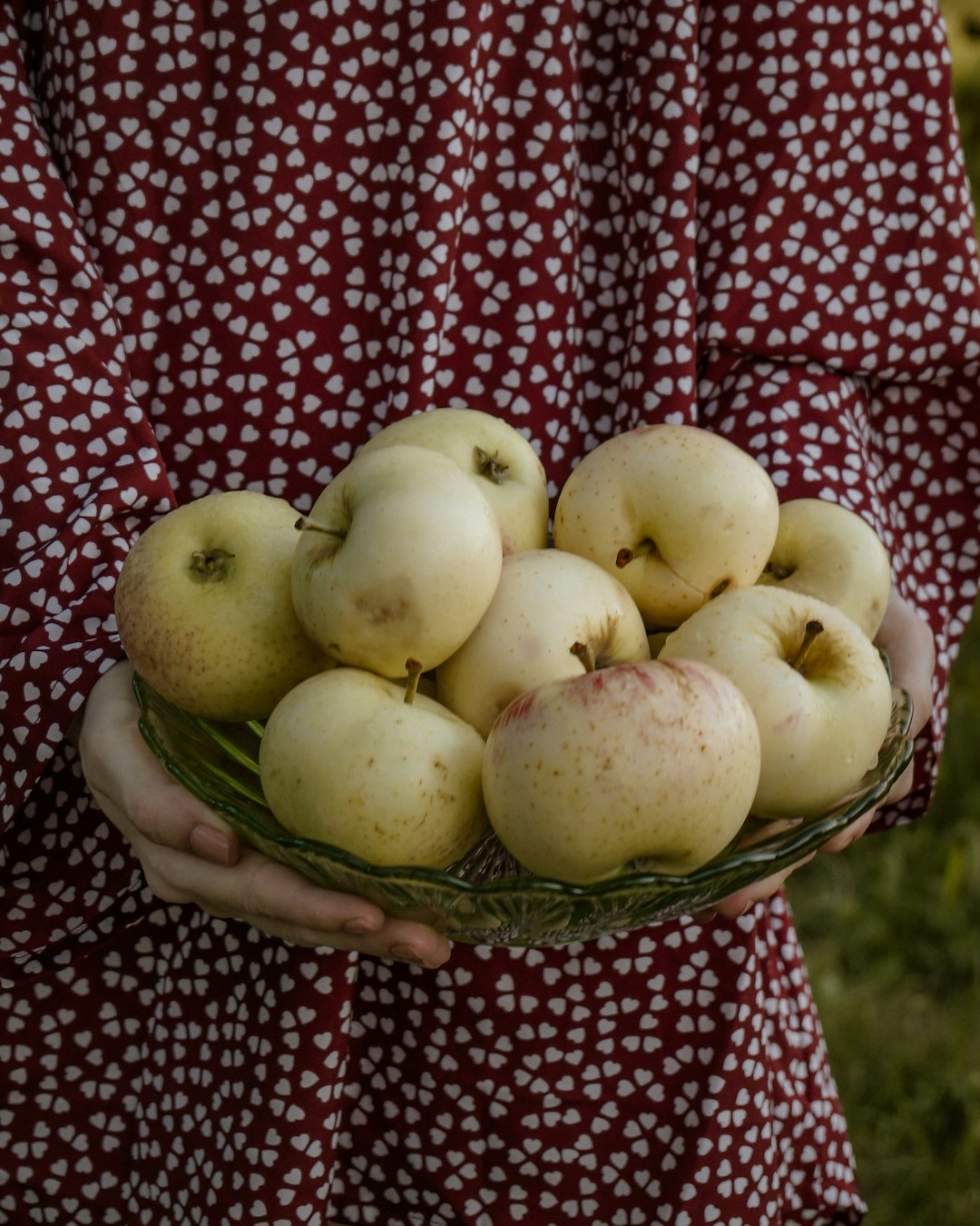 green apples on brown woven basket