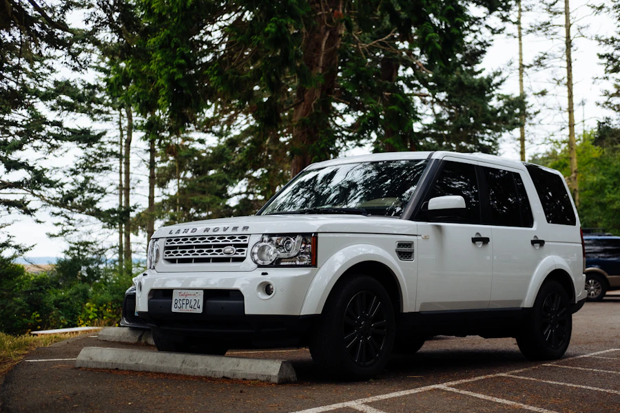 White Land Rover Range Rover SUV parked on a road