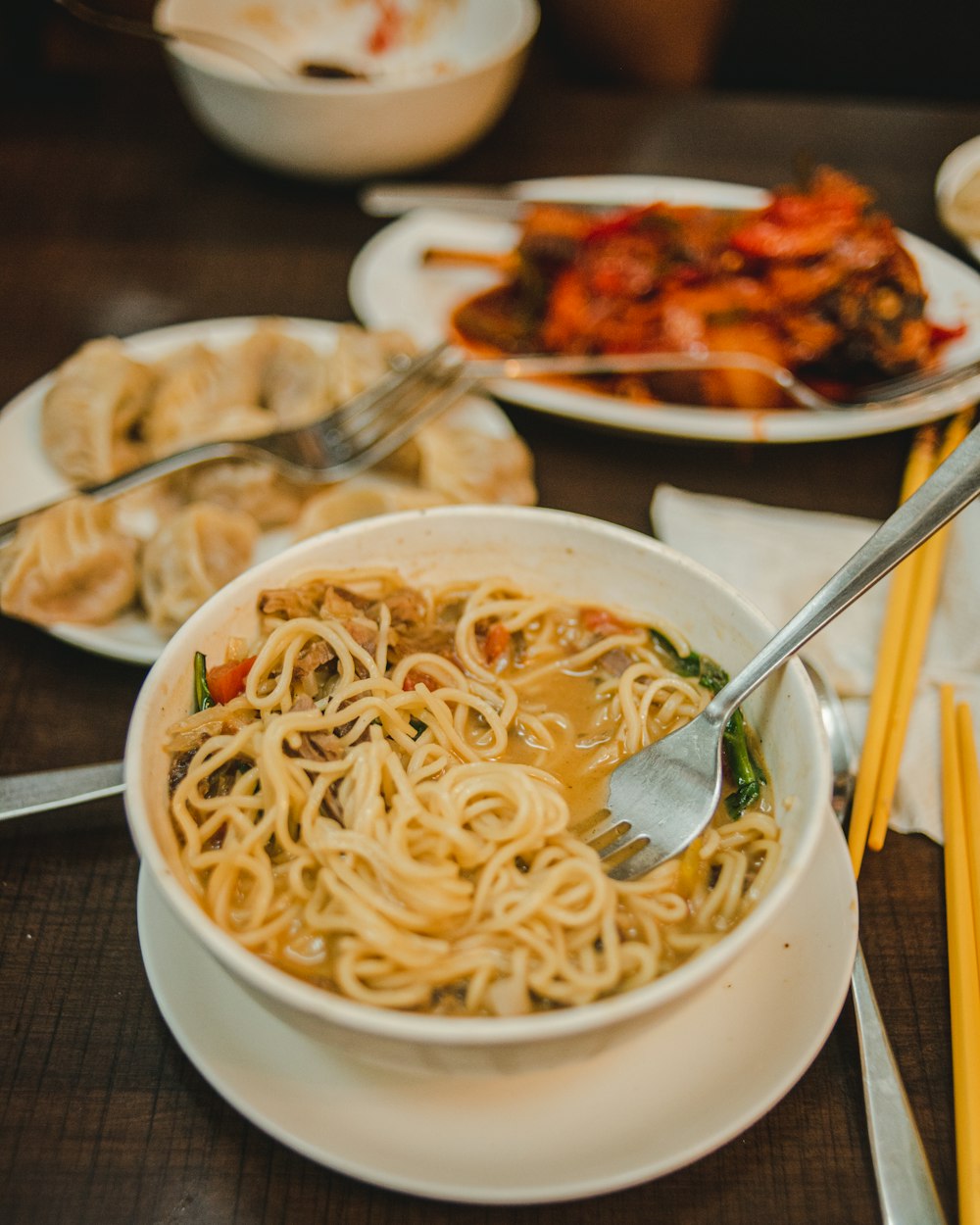 white pasta on white ceramic bowl