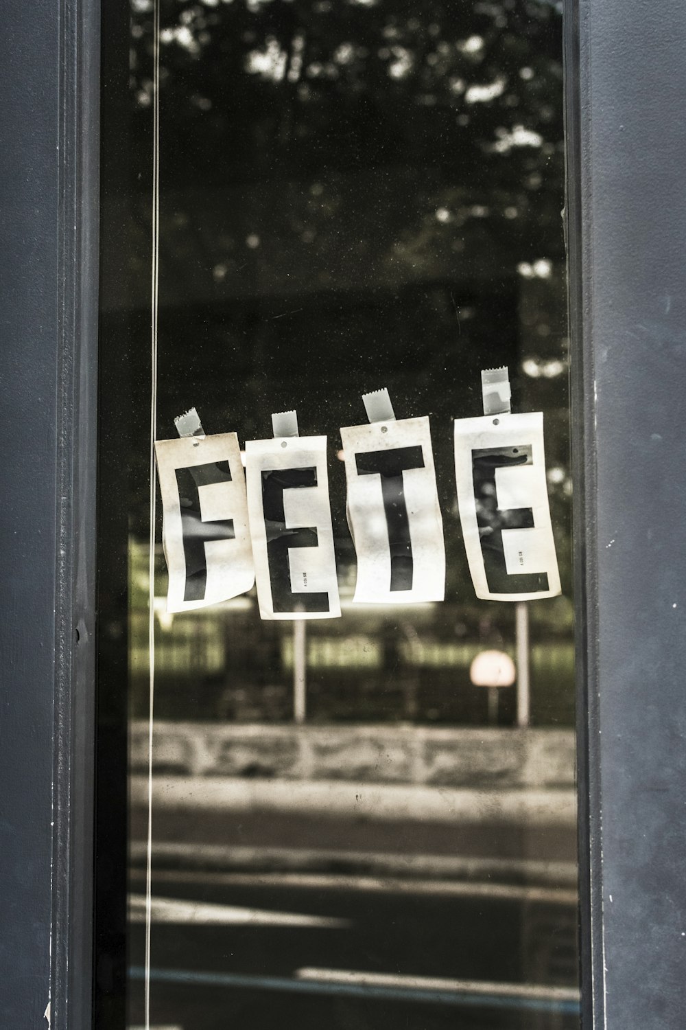 a close up of a window with a sign on it