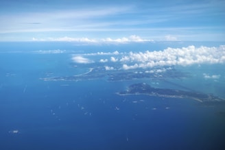 An aerial view of a beautiful island surrounded by ocean.