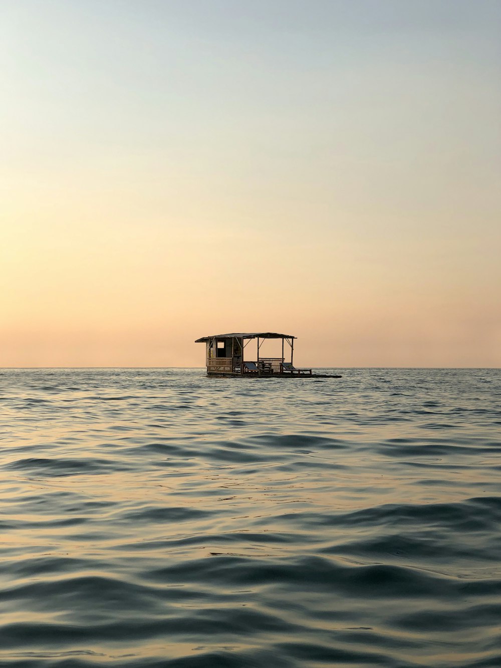 brown wooden dock on sea during daytime