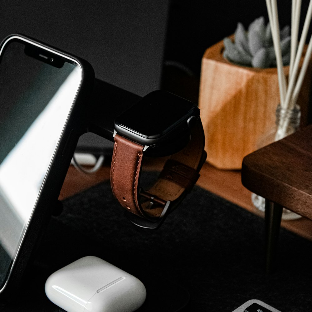 silver aluminum case apple watch with brown leather strap