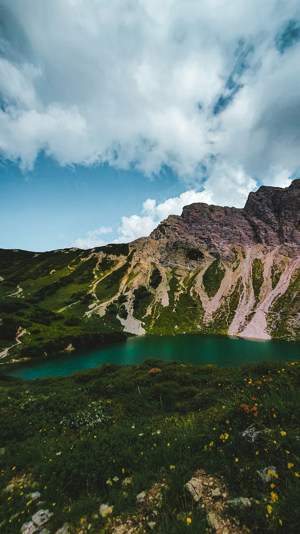 lake in the middle of mountains