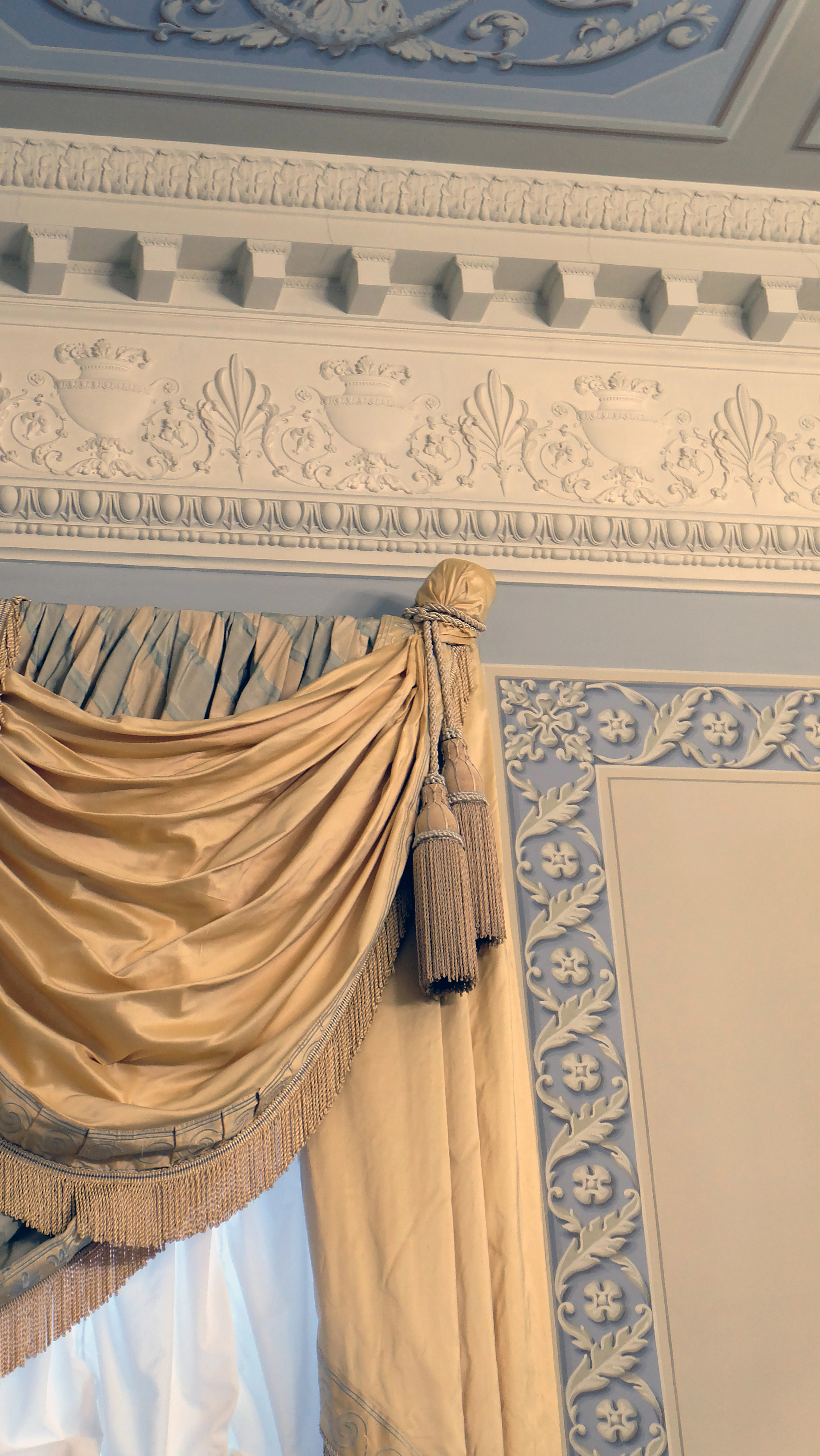 Heavy gold and brown floral drapery