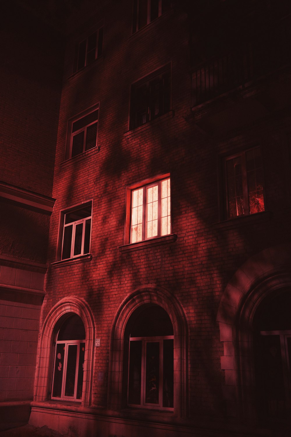 brown brick building with windows