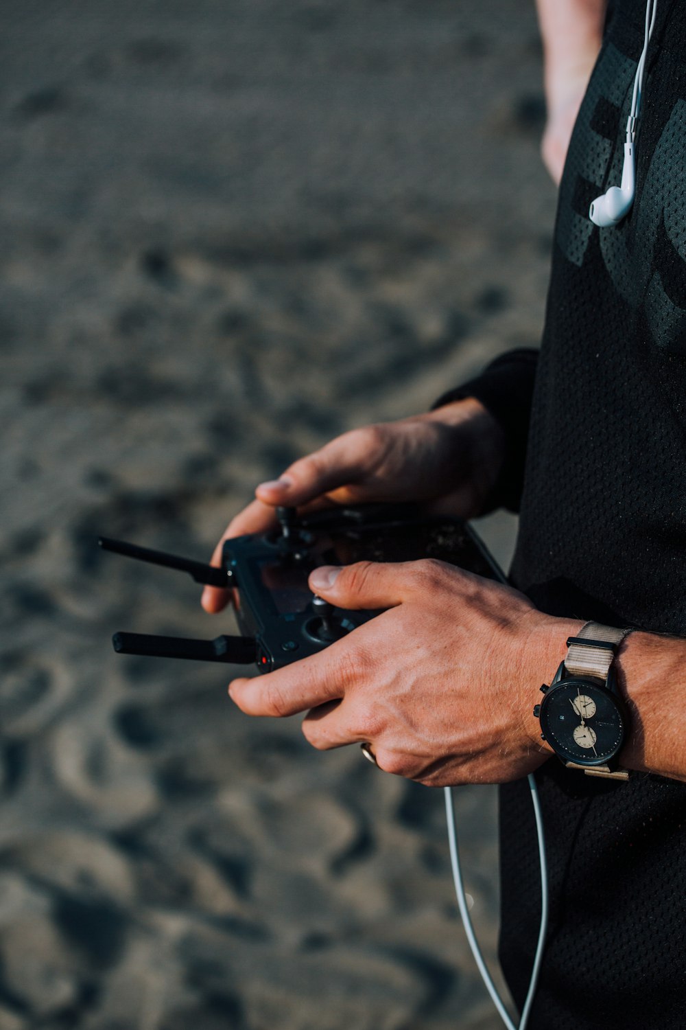 person holding black dslr camera