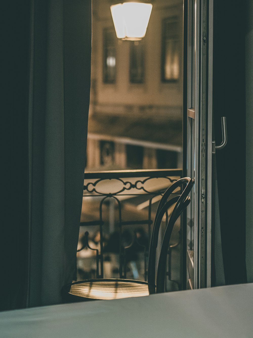 a chair that is sitting in front of a window