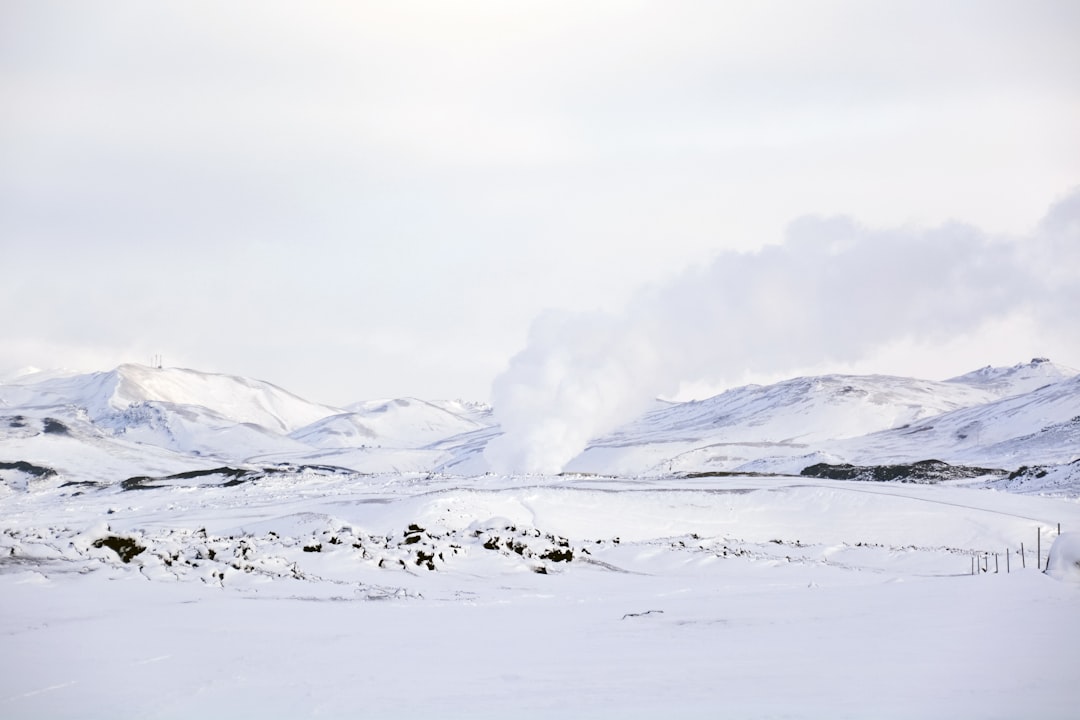 snow covered mountain during daytime